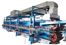 Equipment for the production of polyurethane sandwich panels for walls and roofs