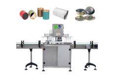 Automatic sealing machine for cans