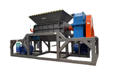 Shredder for shredding rubber and plastic