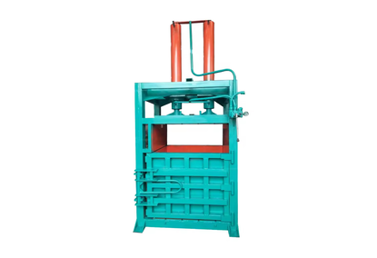 Vertical hydraulic press for packing cardboard boxes and waste paper Vertical hydraulic press for packing cardboard boxes and waste paper
