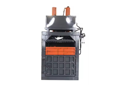 Hydraulic press for packaging waste paper and cardboard