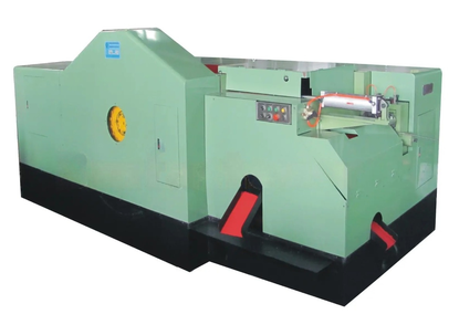 Cold forging machine for nuts Cold forging machine for nuts