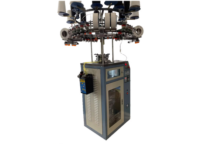 Circular knitting machine for knitting knitwear in a single loop