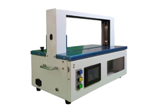 Automatic Machine for Packing and Strapping Paper Bundles