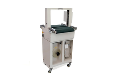 Machine for strapping paper and plastic linen