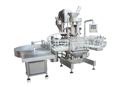 Machine for filling, capping, sealing and labeling granules