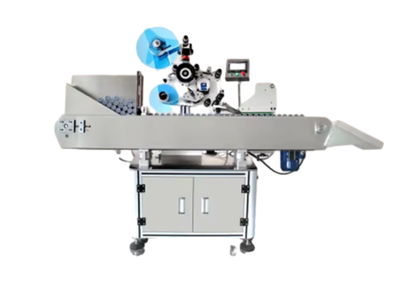 Labeling machine for cylindrical surfaces and bottles Labeling machine for cylindrical surfaces and bottles