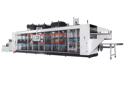 Thermoforming machine with automatic stacking Thermoforming machine with automatic stacking