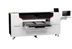 Digital printer for printing on colored fabric